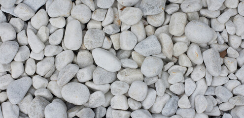 White pebbles background with copy space