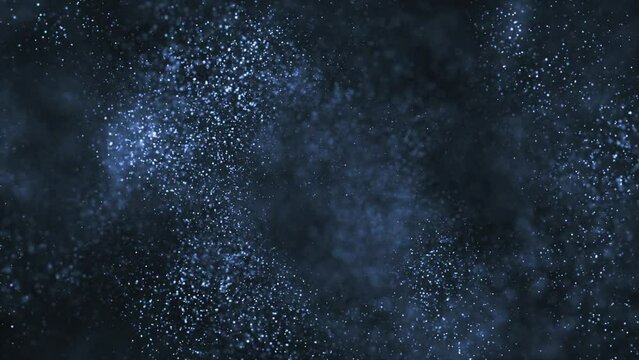 Abstract flowing blue particles motion background animation with shallow depth of field - cosmic stars or galaxy effect.