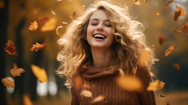 Girl with autumn leaves