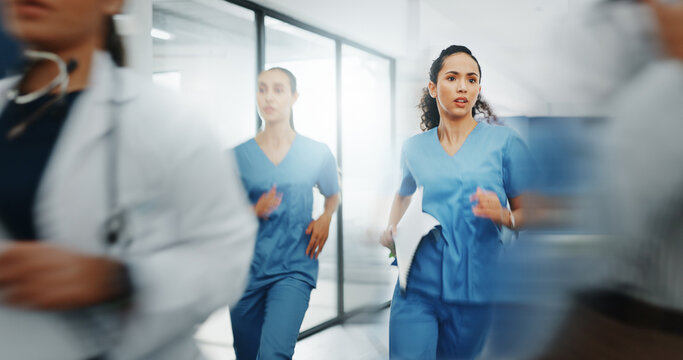 Doctors, nurses or running in hospital emergency, patient crisis or pager call in ICU stress, trauma fail or diversity clinic. Healthcare women, rushing or run in medical hallway to code blue problem