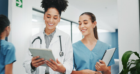 Women doctors, talking or walking in hospital in teamwork, nurse collaboration or surgery research....