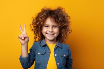 Girl holding a peace sign