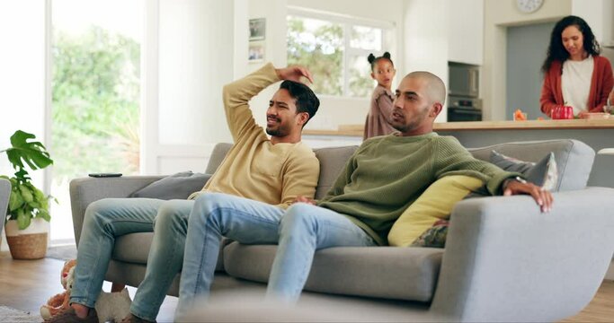Upset, friends and men watching sports together for tournament in the living room of a modern house. Entertainment, angry and male people enjoying a television soccer match at their home with family.