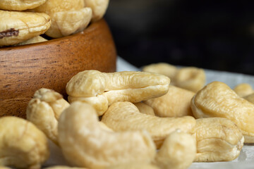 Fresh peeled cashew nuts on the table