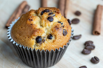 Cupcake with chocolate pieces, close up