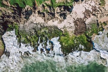 Top down view of the mossy coastline at North Cottesloe Beach in Perth