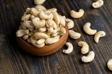 Hard roasted and peeled cashew nuts on the table