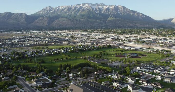 Mount Timpanogos Snow-Capped Wasatch Mountain in Utah County, Aerial Tilt-up Reveal
