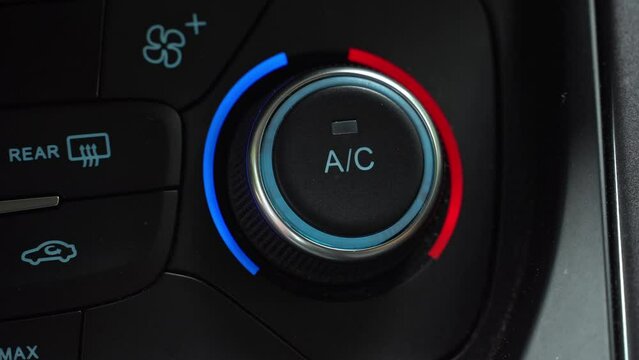 Turning off car climate control button in automatic mode of temperature control in cabin. Separate air conditioner in vehicle