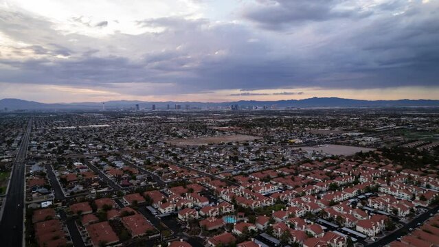 Drone Soars Above Las Vegas Houses in at Morning. Drone Adventures in Las Vegas Neighborhoods. Daytime Life in Las Vegas Neighborhoods