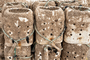 Lobster pots covered in barnacles