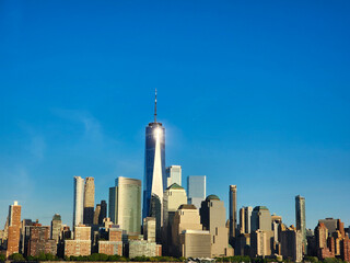 Fototapeta premium new york city. skyscraper cityscape of nyc. ny urban city architecture. midtown manhattan. metropolitan city. metropolis cityscape. new york downtown. manhattan skyline in sunset