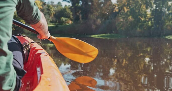 Kayak, river and closeup of man on an adventure to explore the water by rowing while camping in nature. Boat, canoe and person in a lake for vacation or holiday in the countryside for freedom