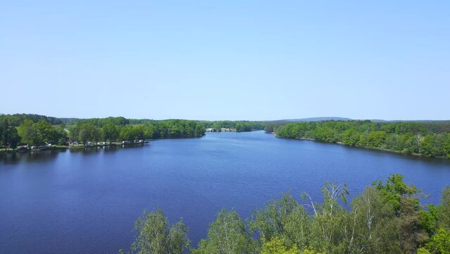 Majestic aerial top view flight 
Natural Summer Paradise idyllic Island in Lake, Chlum in Czech, day 2023. overflight flyover drone
4K Cinematic