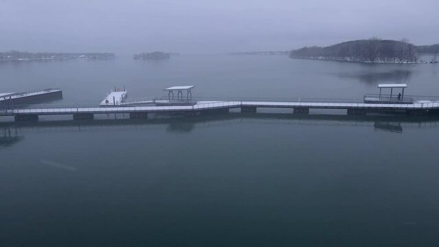 Snow Covered Piers In Detroit River International Wildlife Refuge Humbug Marsh Unit On Moody Winter Day In Detroit, Aerial View