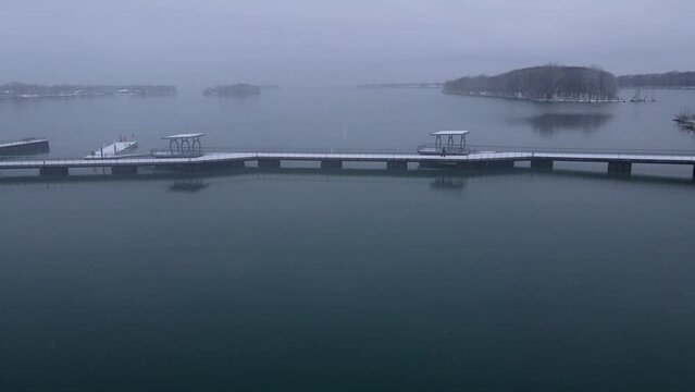 Snow Covered Pier In Detroit River International Wildlife Refuge Humbug Marsh Unit On The Detroit River, Aerial Drone View