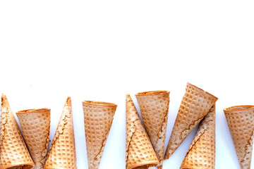 Empty ice cream cone on white background.