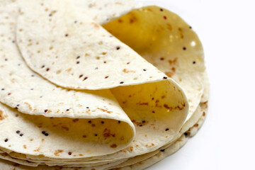 Quinoa tortilla wraps on white background