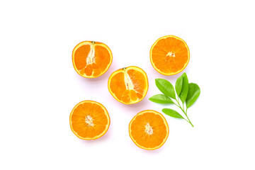 Orange fruit with green leaves on white background.