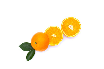 Orange fruit with green leaves on white background.