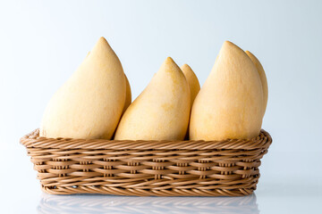 Organic Nam Dok Mai thai Mangoes in basket, Sweet, tasty, refreshing.It is the most popular mango variety in Thailand. concept vitamin from fruit and  information in supermarket.