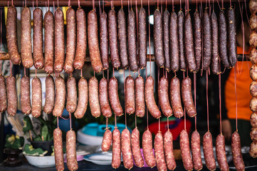 Isaan Sausages, also known as Mum, are both beef and pork hanging on roadsides in the northeastern region of Thailand.