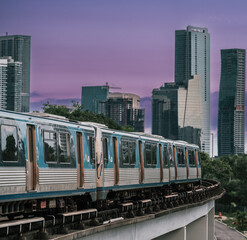 train in the city skyline Brickell Miami