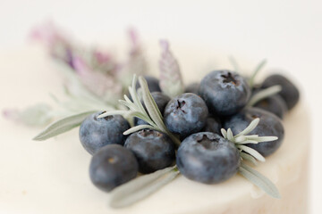 closeup of blueberry, rosemary, and lavender garnish