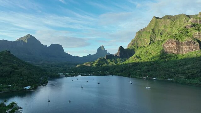 Sailing boats near the Moorea shore in the morning
