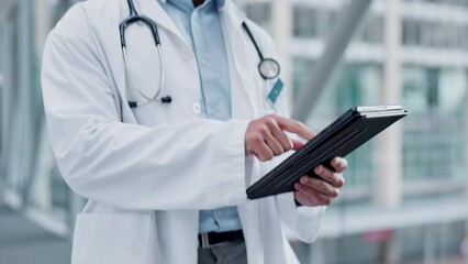 Doctor, tablet and walking in hospital for health care with internet for research, results or information. Hand of professional medical person with tech for scroll, online consultation or telehealth