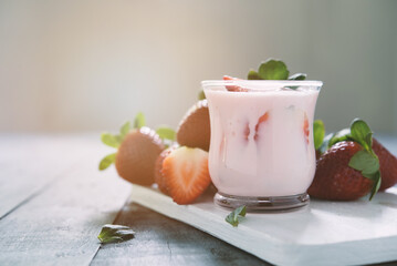 Healthy food of yogurt, Strawberry Yogurt,yogurt with fresh strawberry, wood background