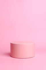 Elegant pastel pink circle podium mockup over pink background, copy space. Template scene for...