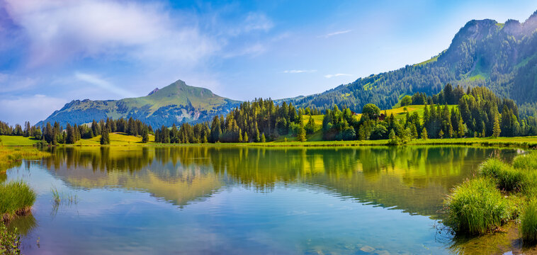 Landscape of Lake Lauenen near Gstaad Bernese Alps, Switzerland.