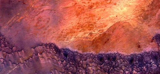 Selbstklebende Fototapeten Hochrot War, abstract photography of the deserts of Africa from the air. aerial view of desert landscapes, Genre: Abstract Naturalism, from the abstract to the figurative,  © munimara
