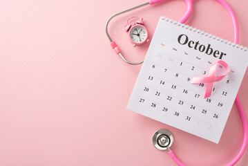 October awareness elements. Top view of calendar, stethoscope, pink ribbon, and small alarm clock on pastel pink background, presenting a captivating space for text or adverts