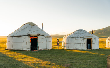 Sunset at the yurt camp.Discover the nomadic life of the nomads camping and in yurt camps. Yurt is a circular tent of felt or skins on a collapsible framework.