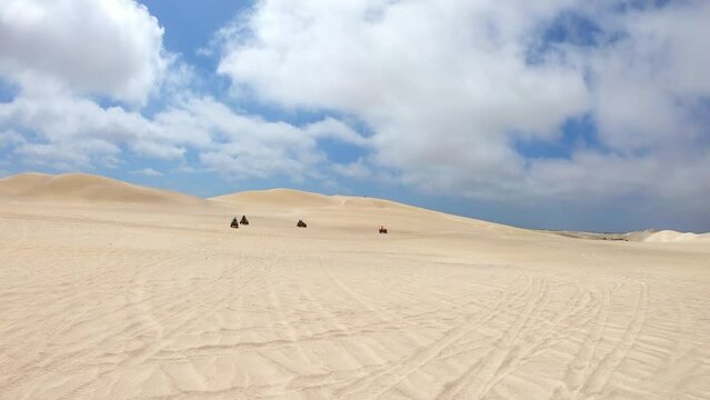 Quad biking at Lancelin Sand Dunes, Western Australia.