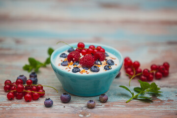 Yogurt with granola and fresh berries