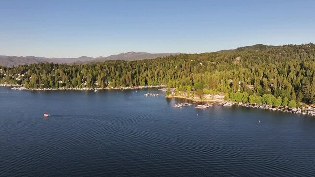 beautiful lake arrowhead blue water and boats during sunset AERIAL TRUCKING PAN