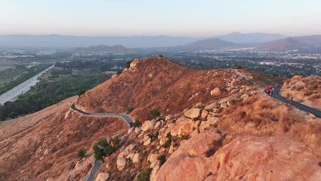 mt rubidoux in riverside california at sunset with people hiking in view