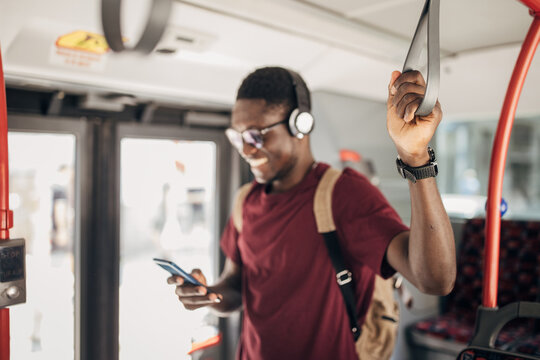 Young man in the public bus