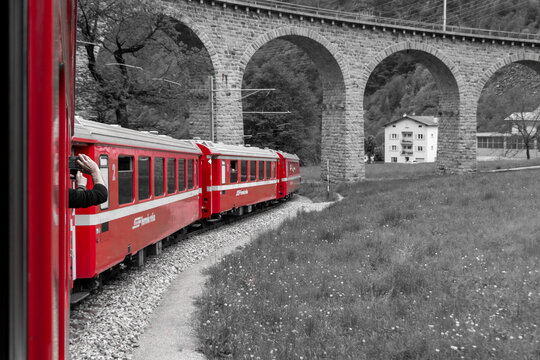 The Bernina Express under The famous Brusio spiral viaduct