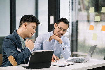 Male Operations Manager Holds Meeting Presentation for analysis graph company financial. People Work in Business Office.
