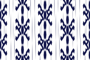 Ethnic ikat seamless pattern in tribal. Aztec geometric ethnic ornament print. Ikat pattern style. Design for background, wallpaper, illustration, fabric, clothing, carpet, textile, batik, embroidery.