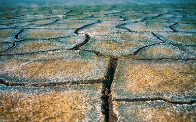 Desert varnish. A dry period (drought season) and the lake in the desert dried up