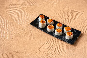 sushi is a Japanese dish of prepared vinegared rice, usually with some sugar and salt, accompanied by a variety of ingredients such as seafood, often raw and vegetables.