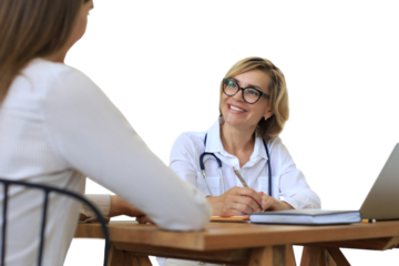 Middle aged female doctor therapist in consultation with patient on a transparent background
