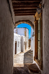 Naklejka premium Streets of Chora and iconic Monastery of Saint John the Theologian in chora of Patmos island, Dodecanese, Greece