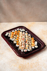 sushi is a Japanese dish of prepared vinegared rice, usually with some sugar and salt, accompanied by a variety of ingredients such as seafood, often raw and vegetables.