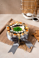 sushi is a Japanese dish of prepared vinegared rice, usually with some sugar and salt, accompanied by a variety of ingredients such as seafood, often raw and vegetables.